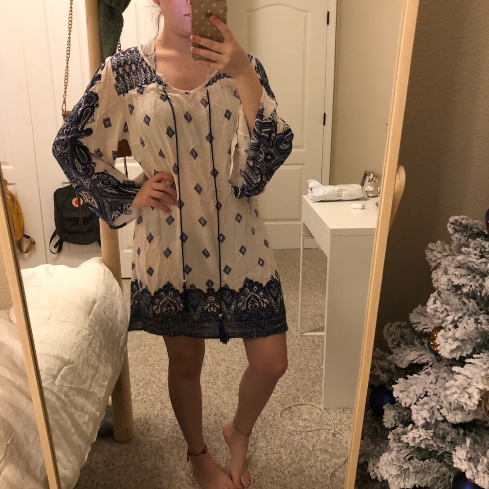 white dress with blue design